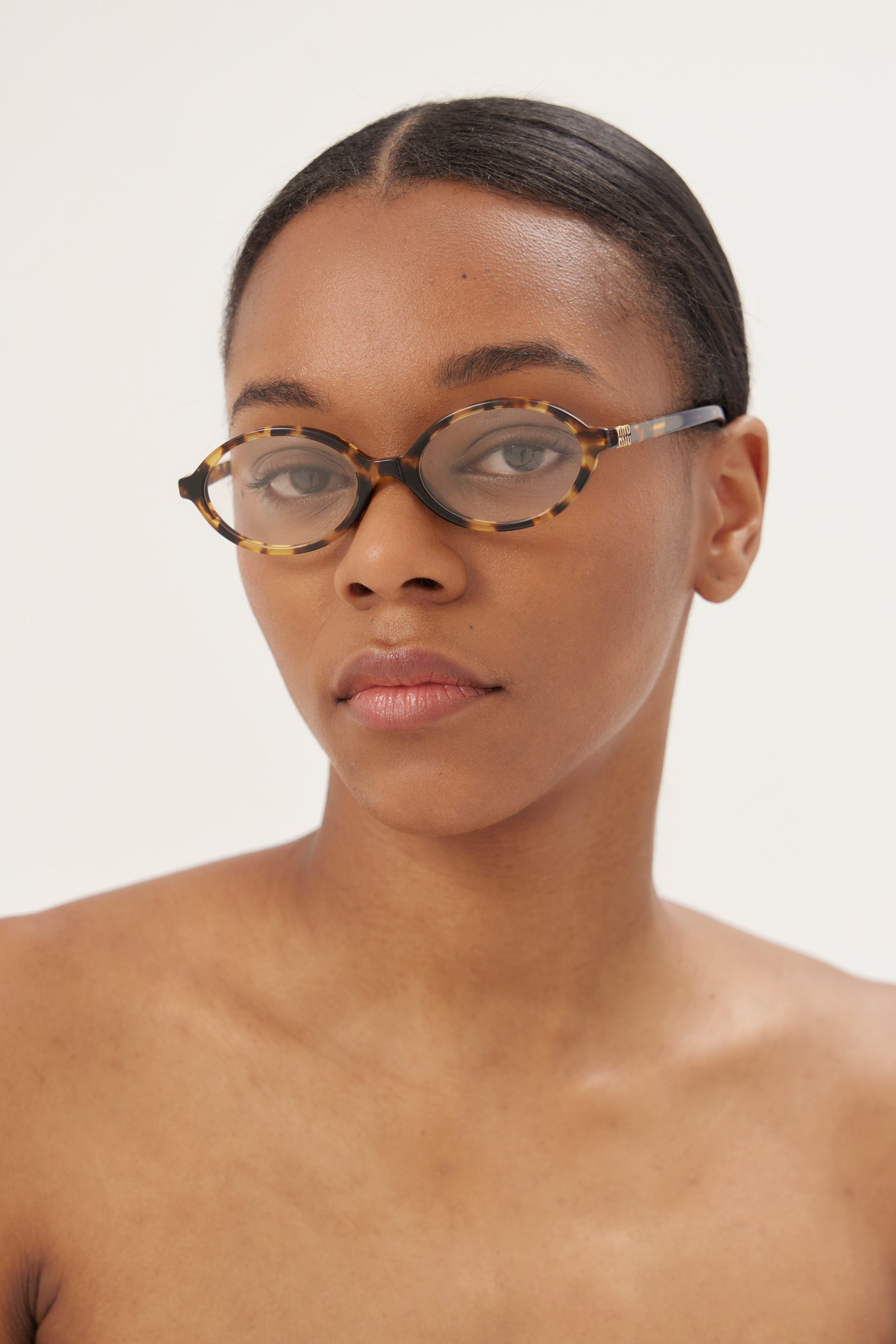 Occhiali da sole Miu Miu HABANA MIEL ovali in acetato
