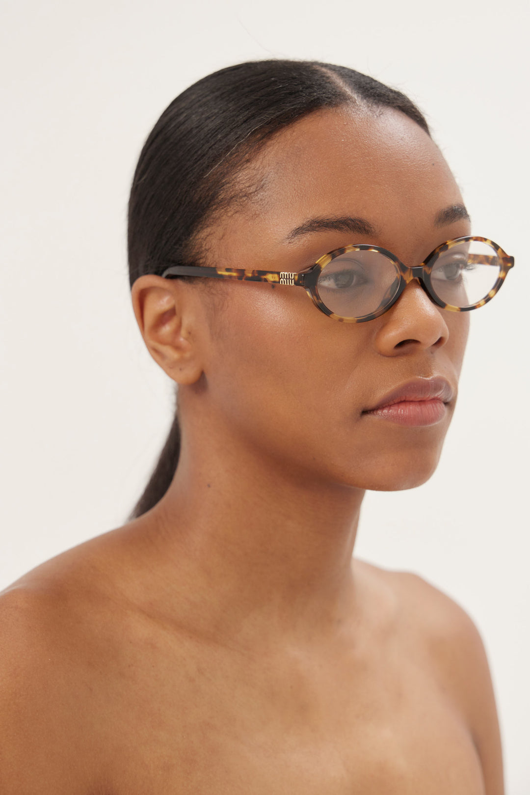 Occhiali da sole Miu Miu HABANA MIEL ovali in acetato
