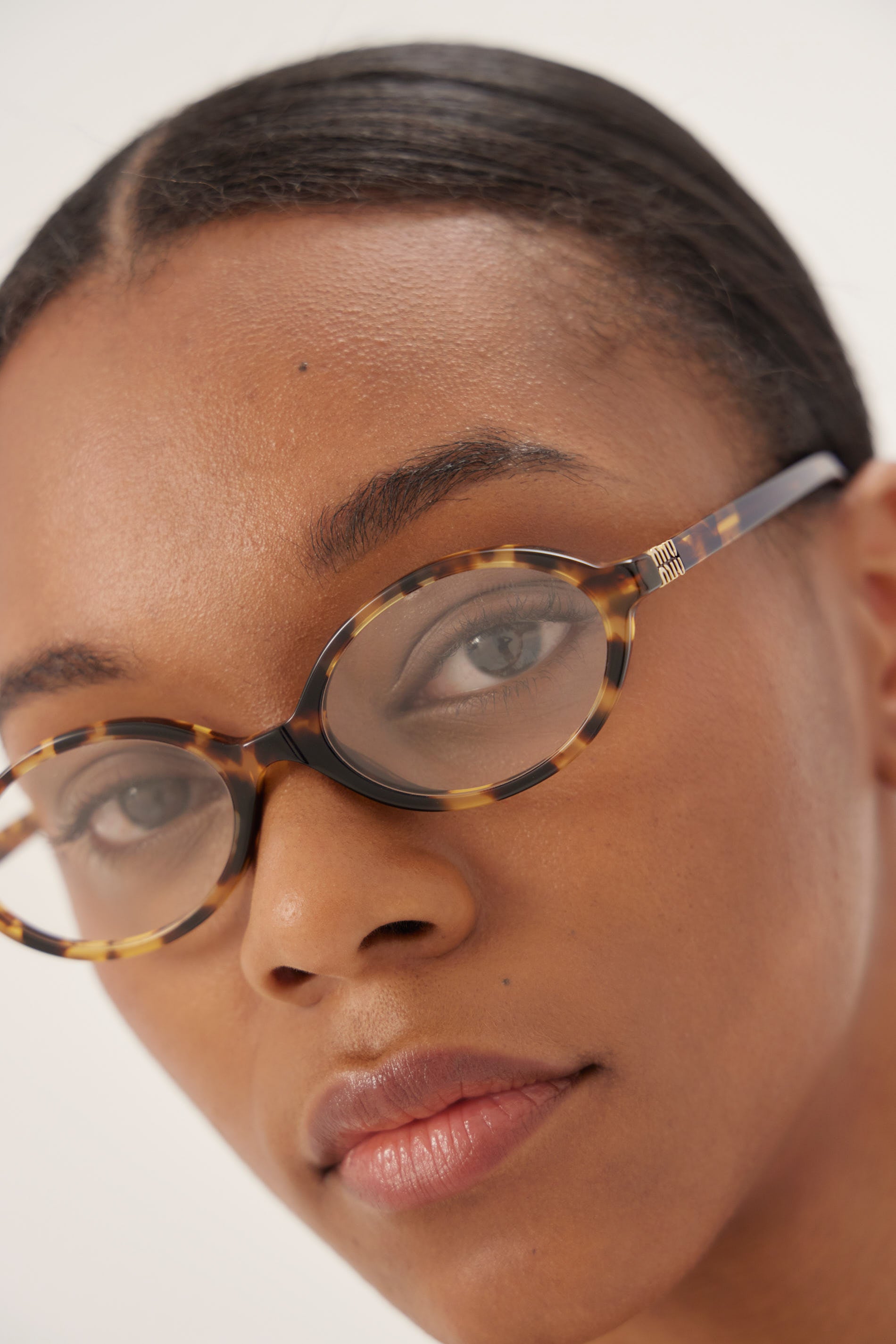 Occhiali da sole Miu Miu HABANA MIEL ovali in acetato