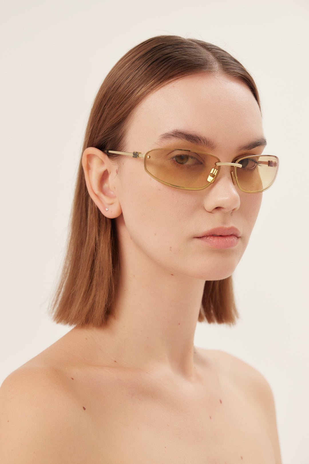 Miu Miu gold racing sunglasses 0MU A50S 5AK7R1