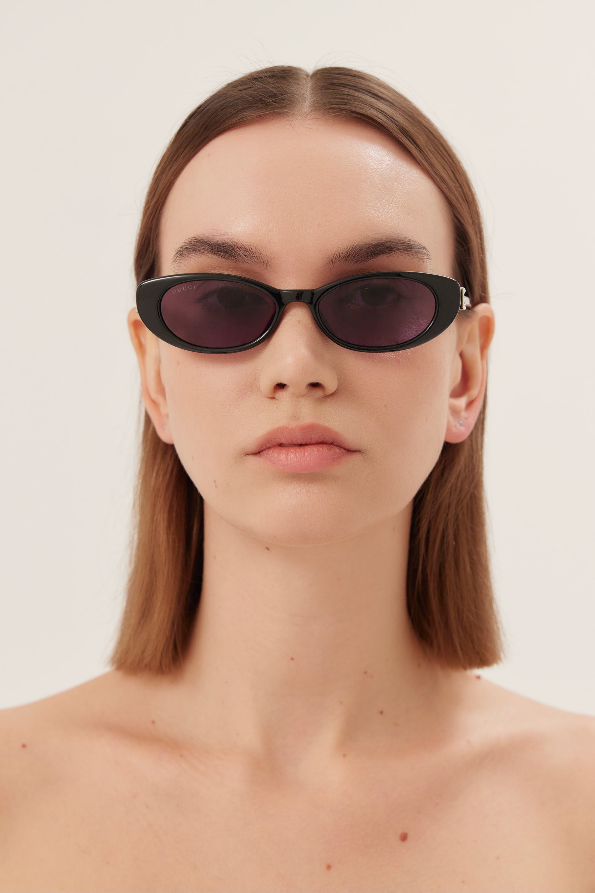 PRE ORDER Oval cat-eye black Gucci sunglasses with bedded logo