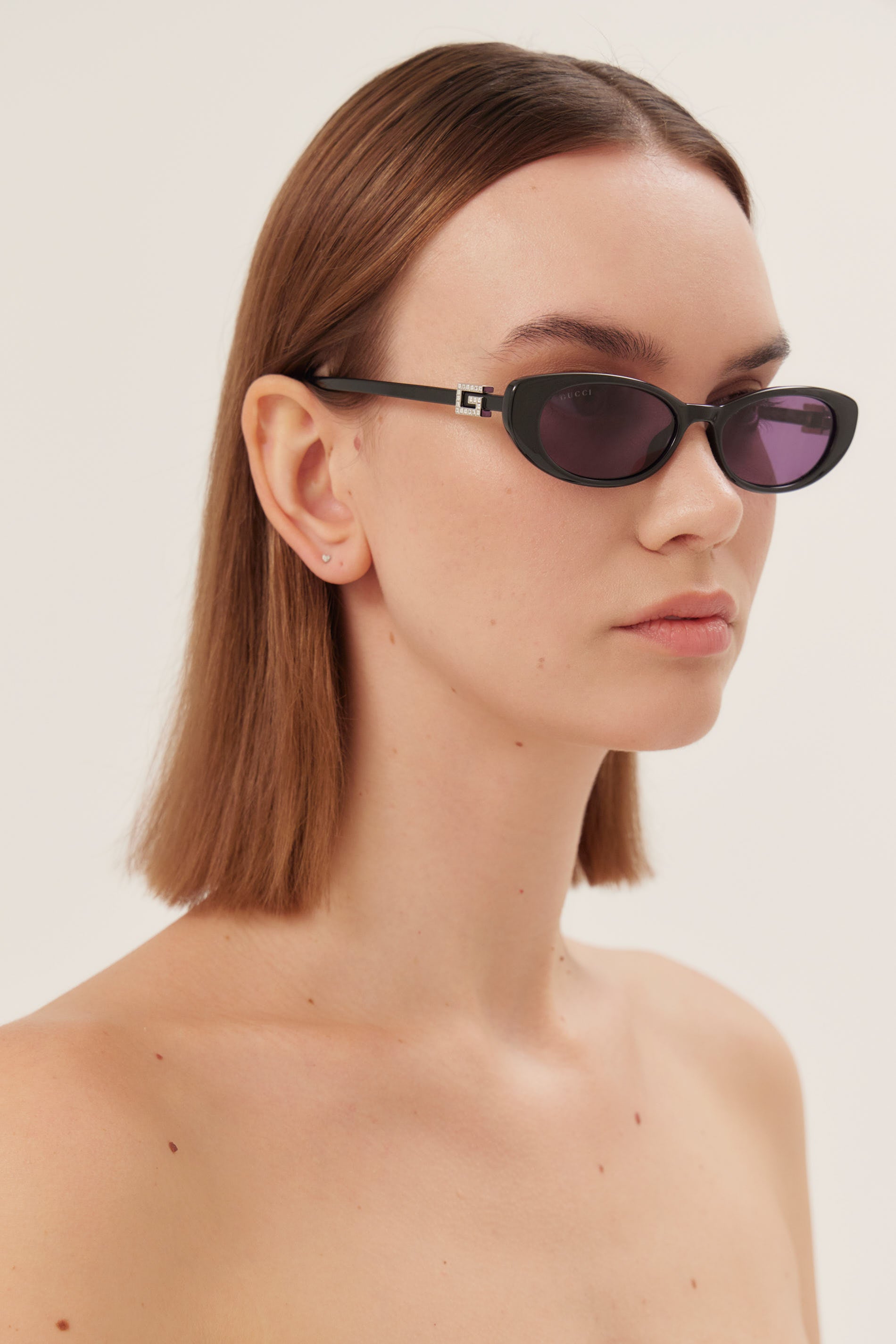 PRE ORDER Oval cat-eye black Gucci sunglasses with bedded logo