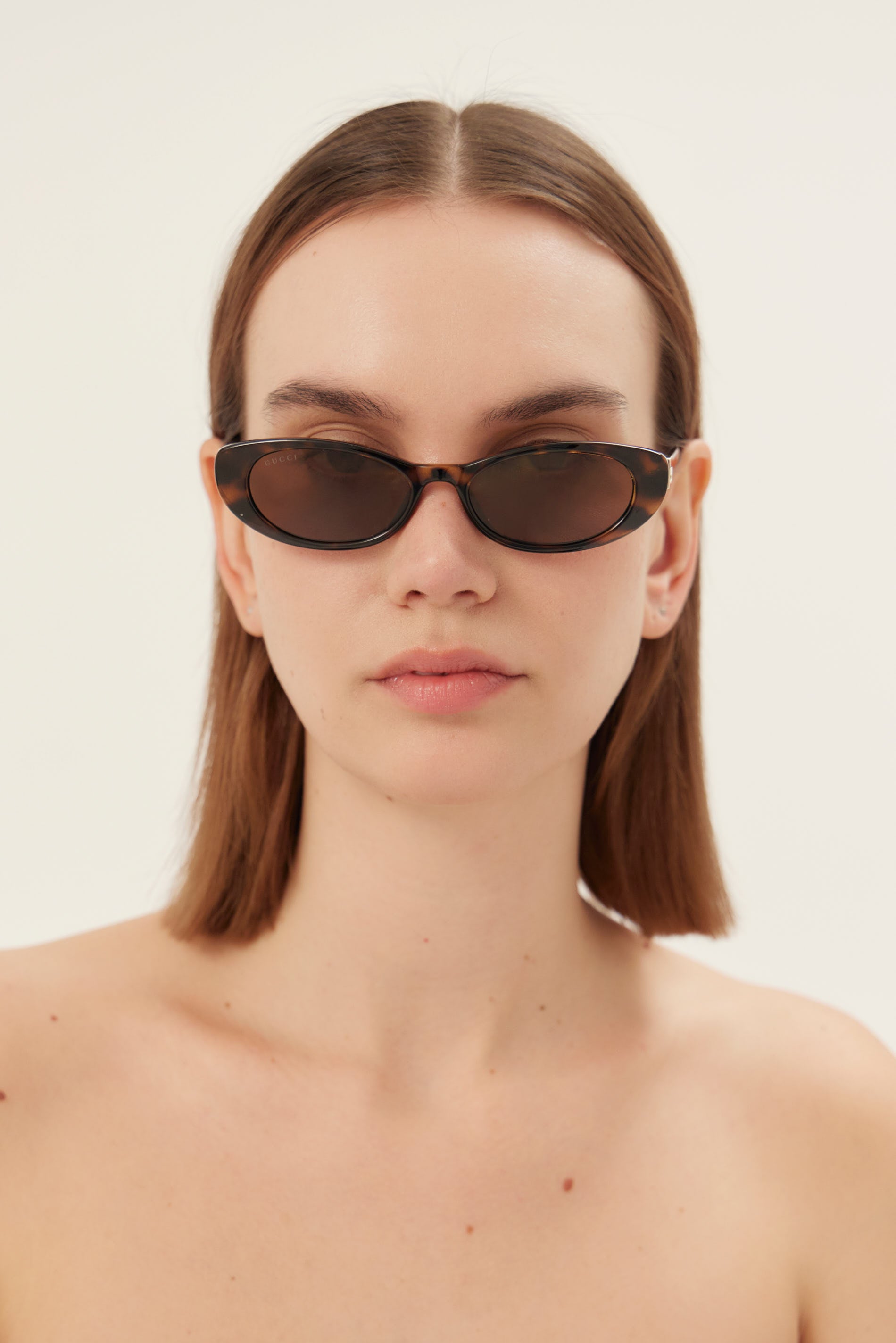 PRE PEDIDO - Gafas de sol Gucci ovaladas de ojo de gato en marrón habano con logotipo dorado